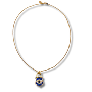 Gold necklace with a blue and gold lock-shaped pendant on a white background