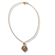 Necklace with a colorful heart-shaped pendant on a white background