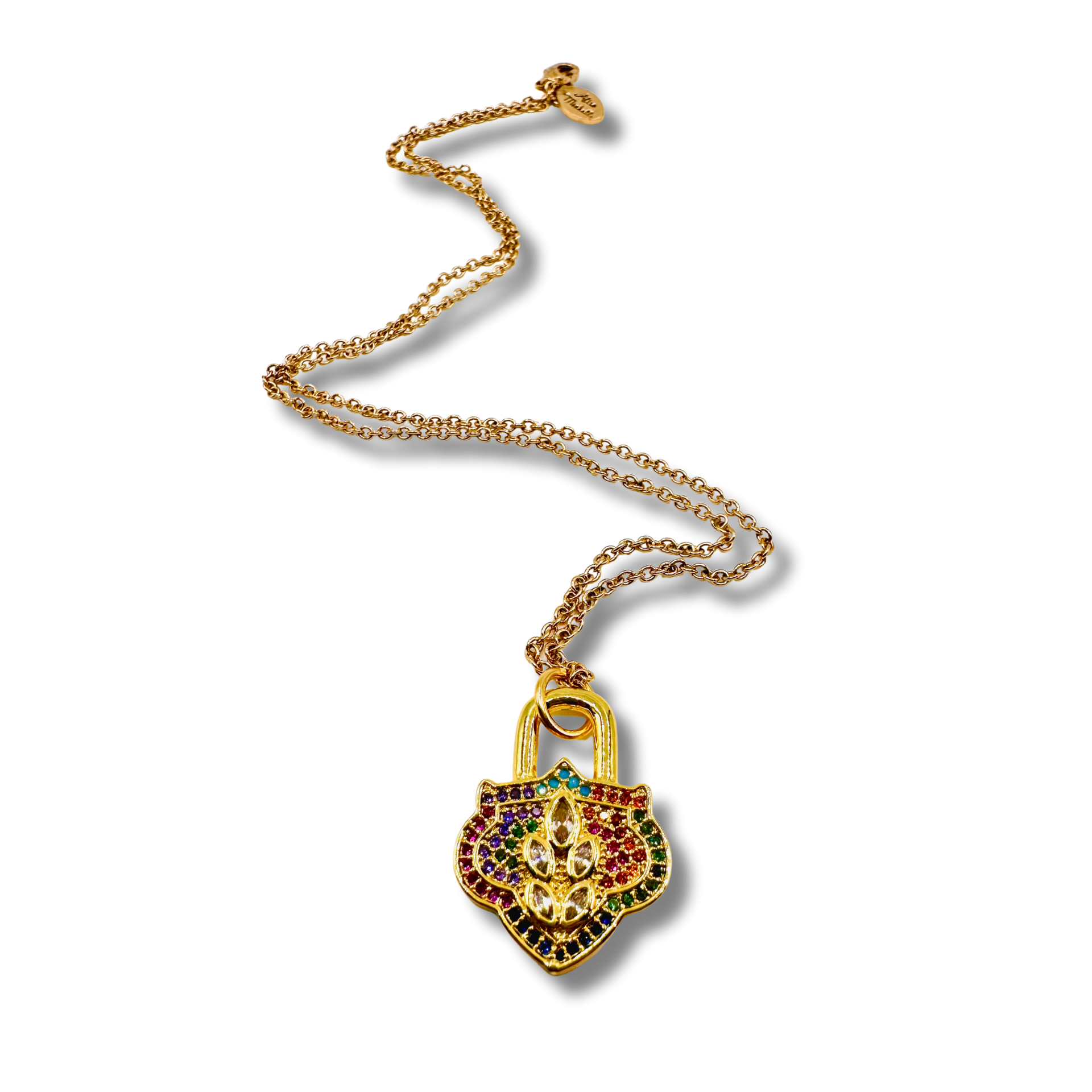 Gold necklace with a colorful pendant on a white background