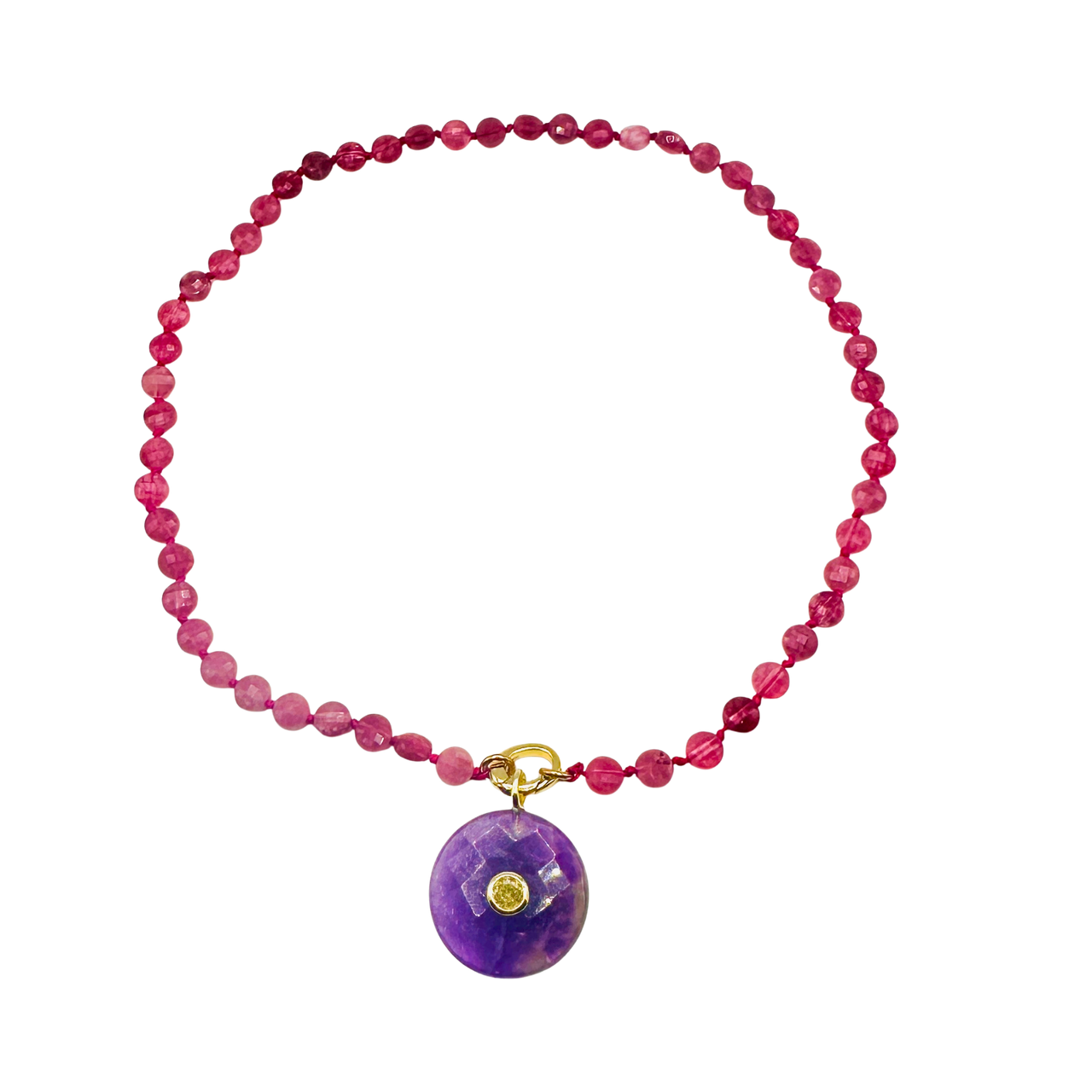 Pink beaded Necklace with a purple pendant on a white background