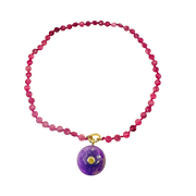 Pink beaded Necklace with a purple pendant on a white background