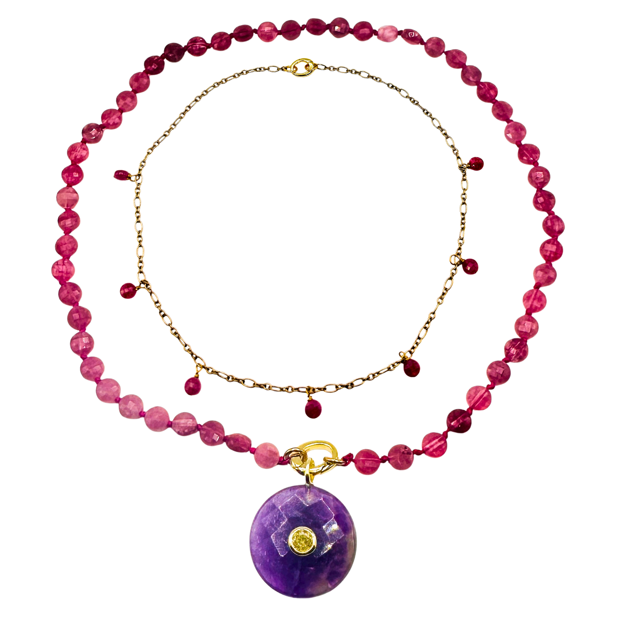 Necklace with pink beads and a purple pendant on a white background