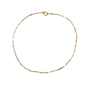 Gold chain necklace on a white background