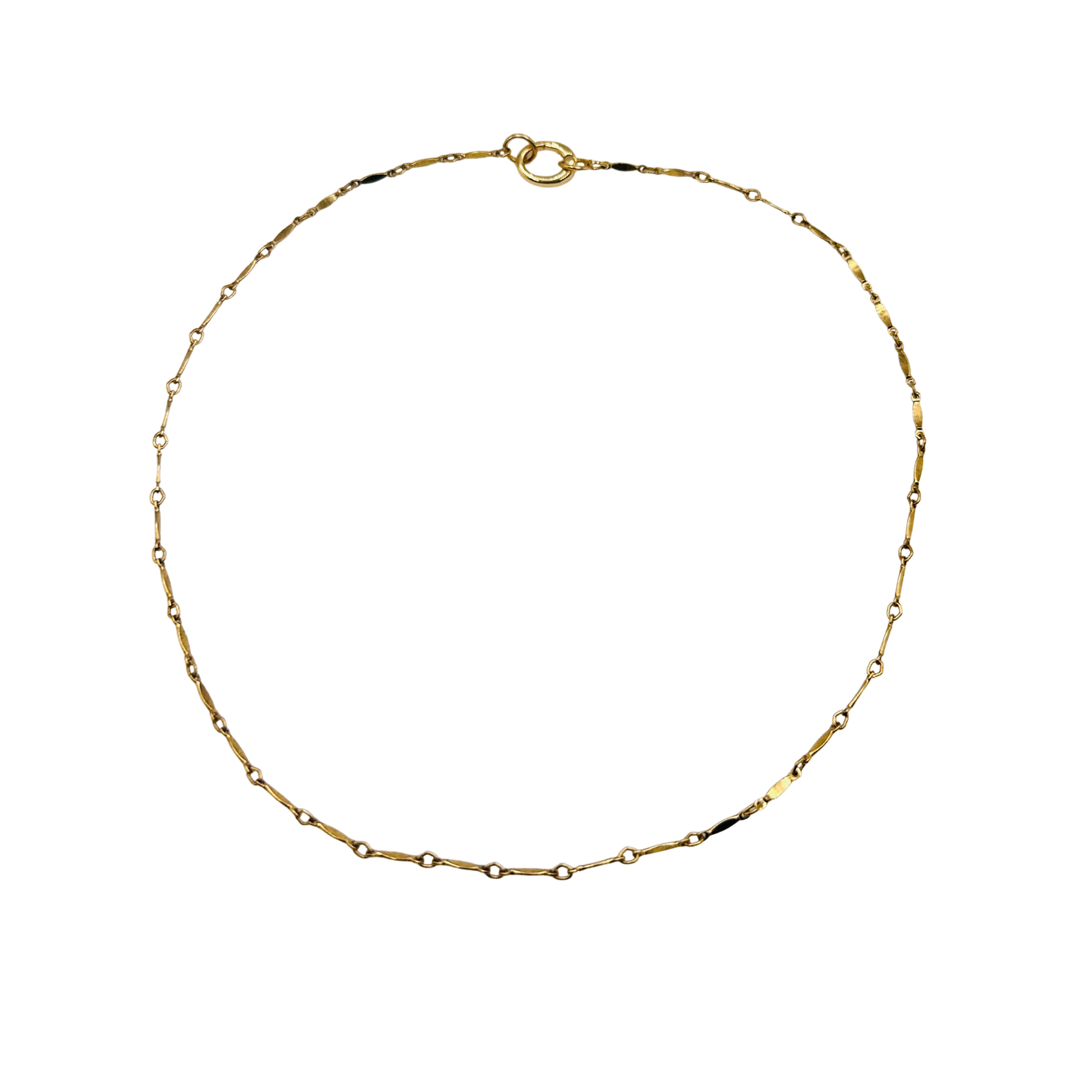 Gold chain necklace on a white background