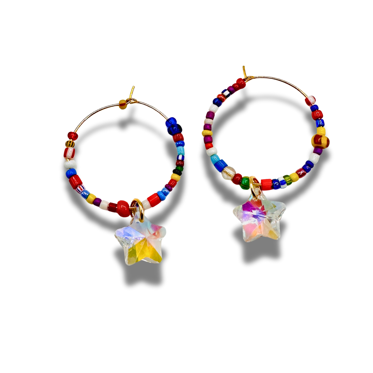 Colorful beaded hoop earrings with star-shaped charms on a white background