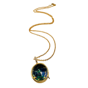 A gold chain necklace with an oval pendant featuring a colorful, marbled pattern resembling green, blue, and gold, set against a plain white background.