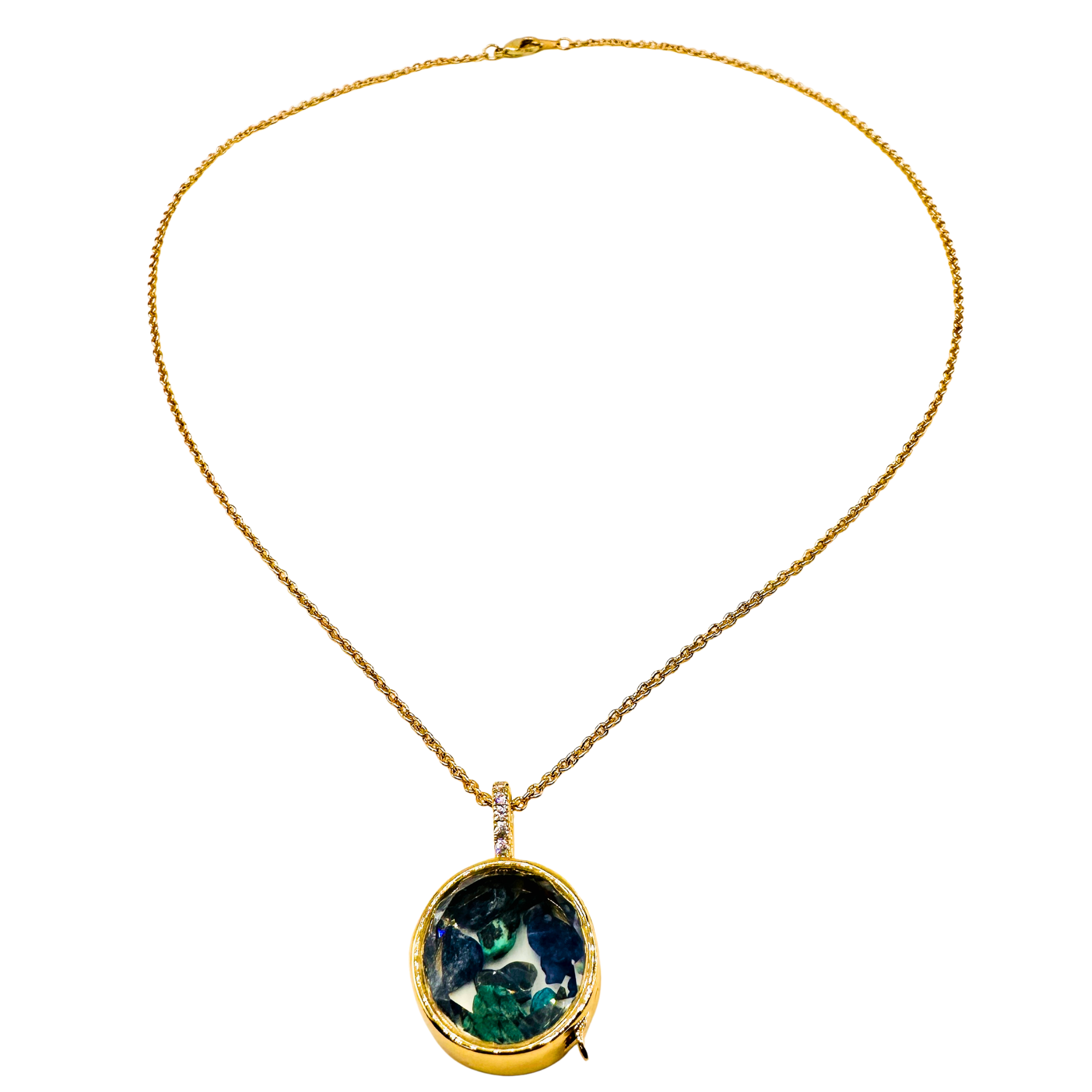 A gold chain necklace with a round pendant featuring a green and blue marbled pattern, set in a gold bezel with a small clear accent stone, shown against a plain white background.