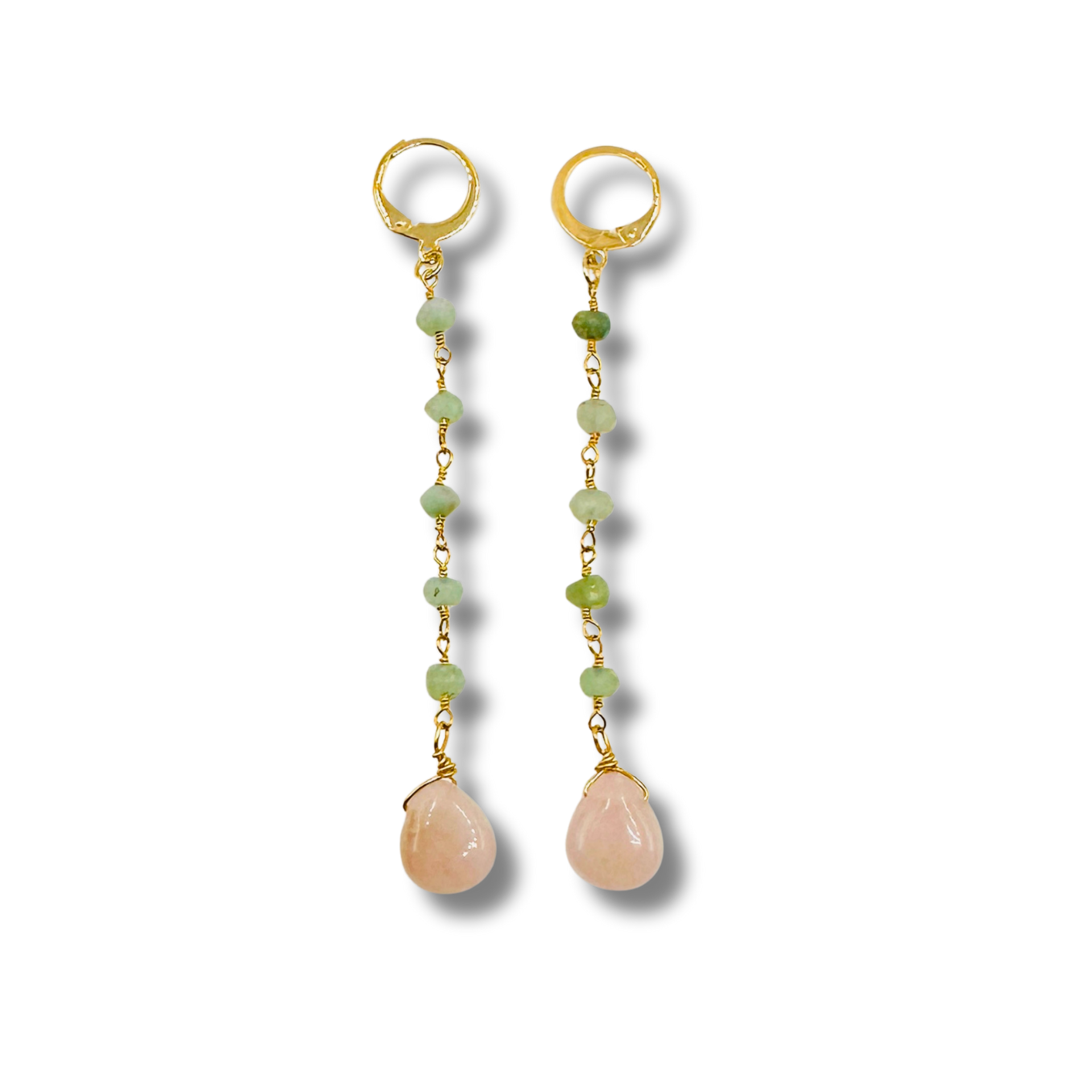 Pair of gold earrings with green beads and pink teardrop stones on a white background
