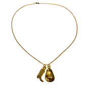 Gold necklace with two pendants on a white background