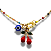 Necklace with colorful charms on a white background, evil eye, cherries