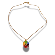 Necklace with a colorful circular pendant on a white background