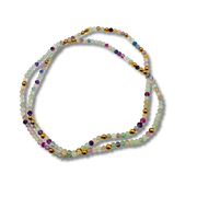 Multicolored beaded necklace on a white background