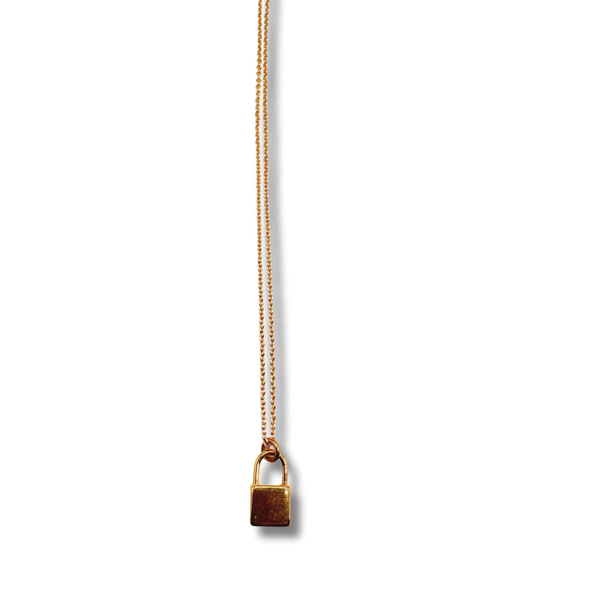 Gold necklace with a small padlock pendant on a white background