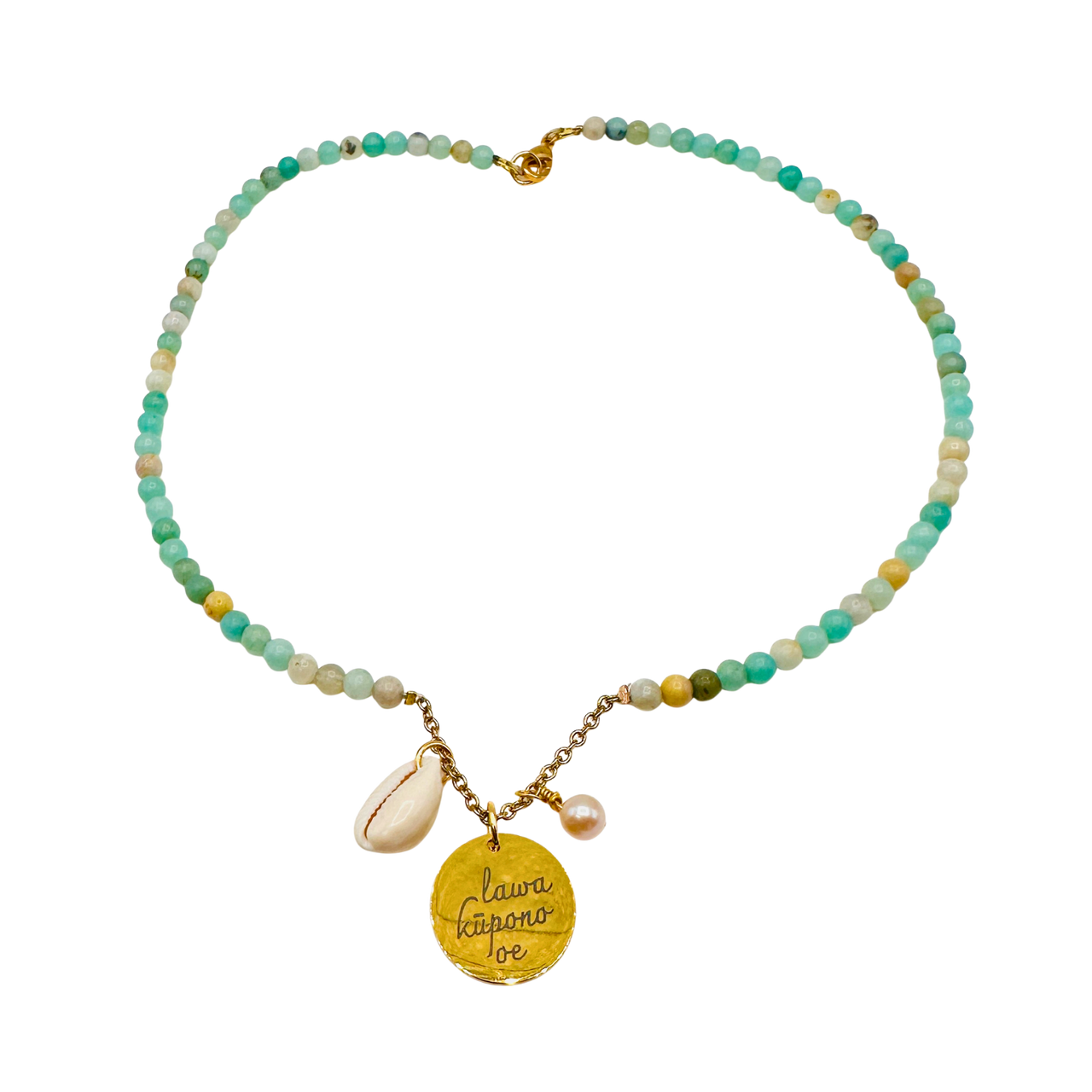 Beaded necklace with a yellow pendant and shell charm on a white background