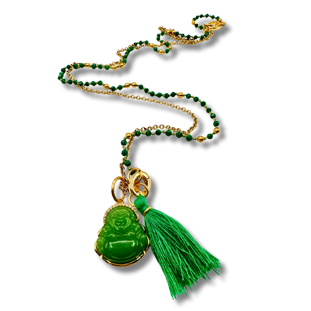 Necklace with green Buddha pendant and tassel on a white background
