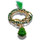 Green and gold beaded necklace with a Buddha pendant on a white background
