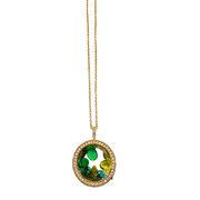Necklace with a round pendant featuring green stones on a white background