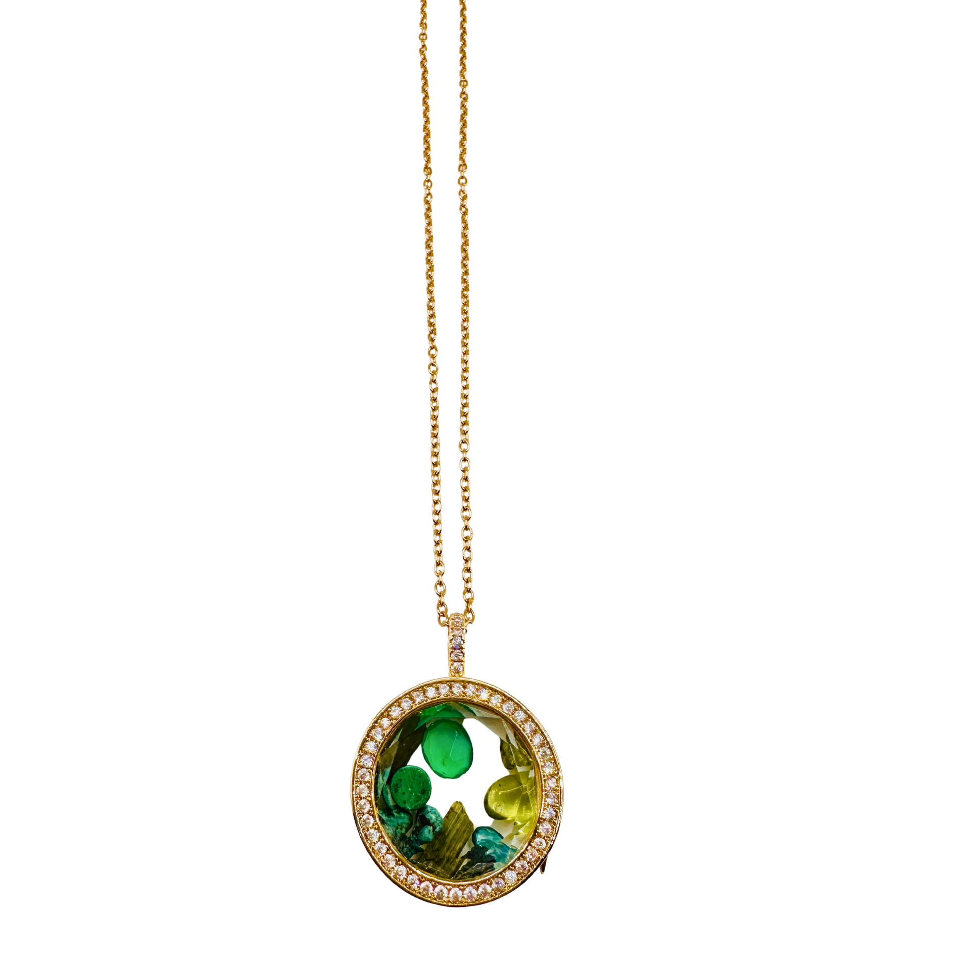 Necklace with a round pendant featuring green stones on a white background