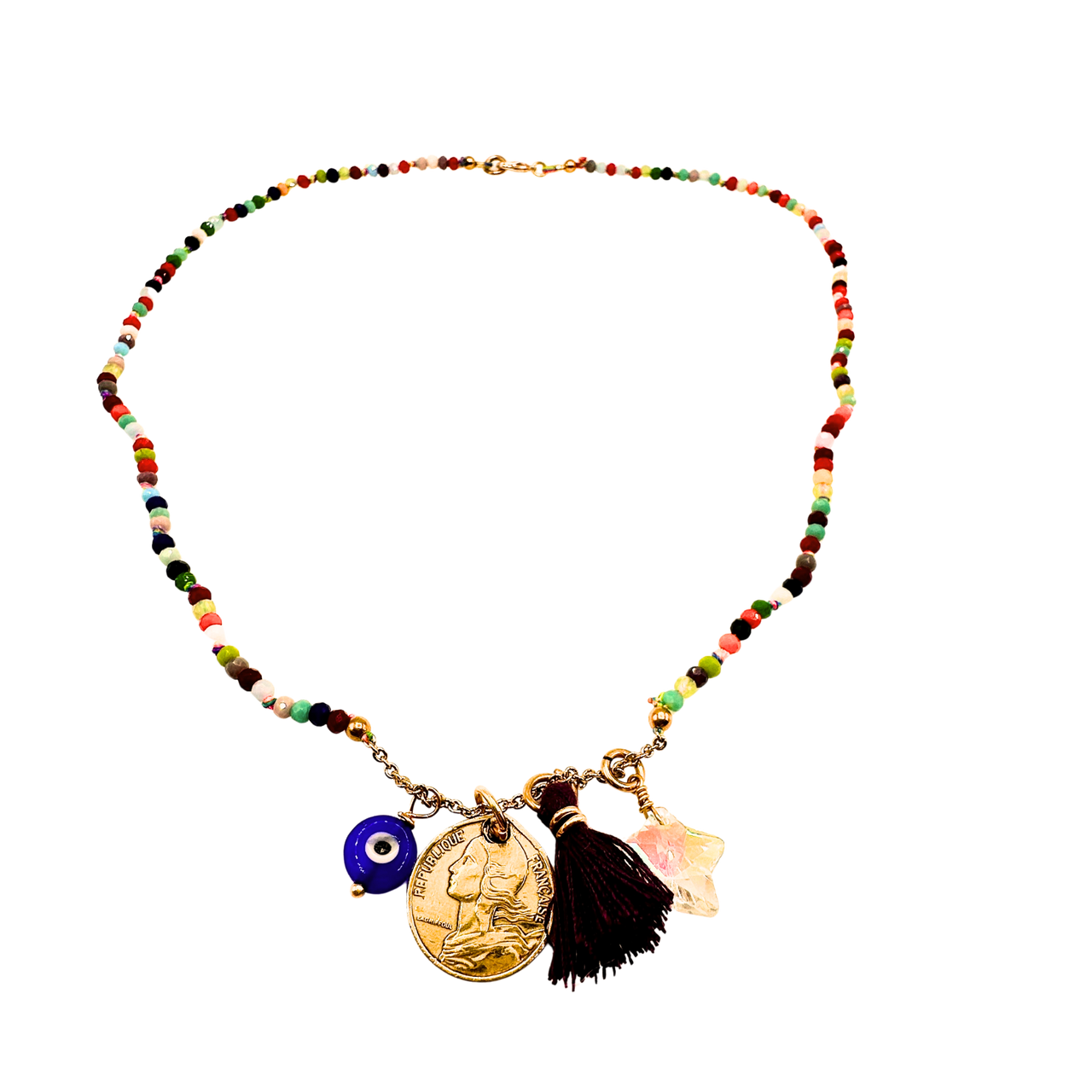 Colorful beaded necklace with various charms on a white background
