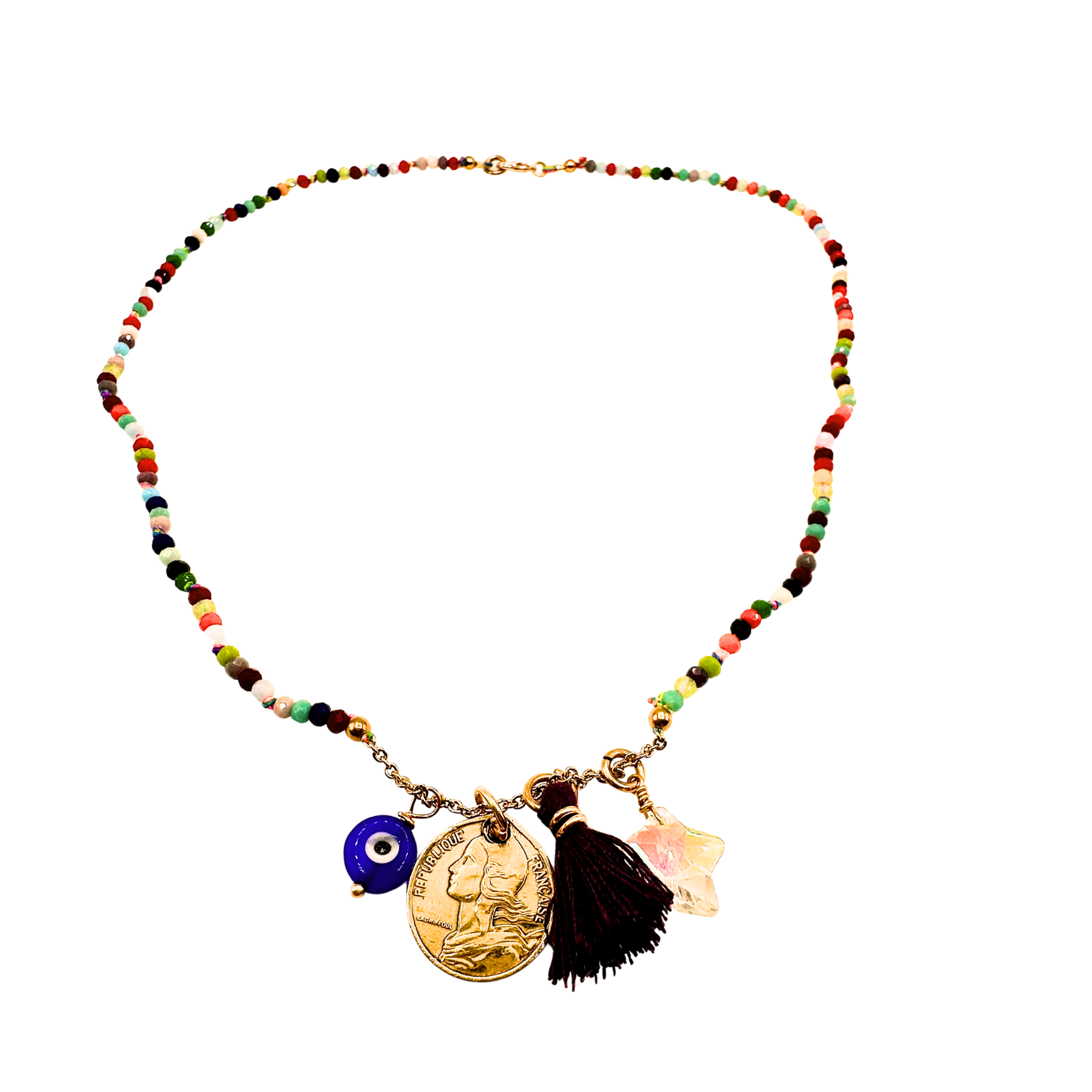 Colorful beaded necklace with various charms on a white background