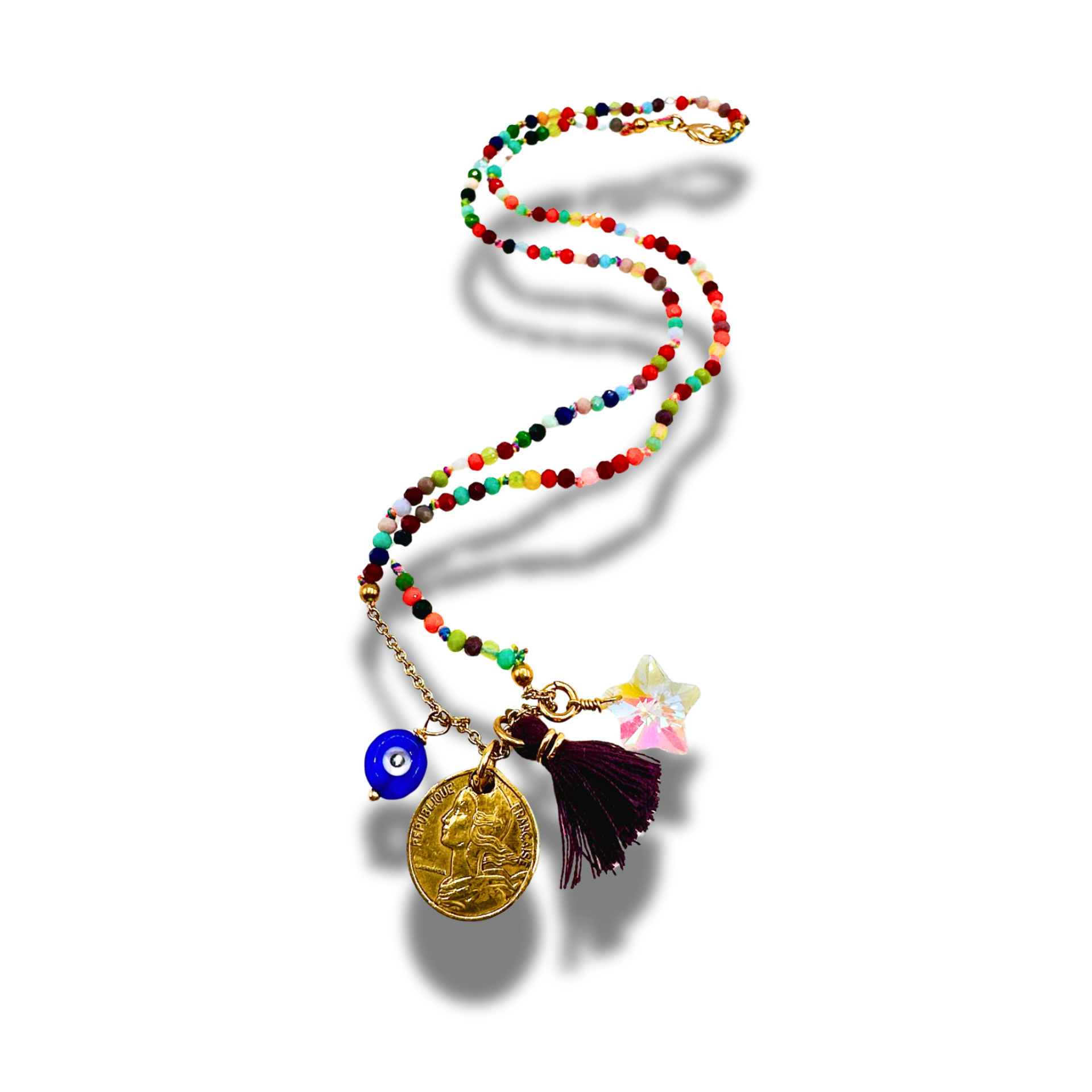 beaded charm necklace with coin, evil eye, star, tassel