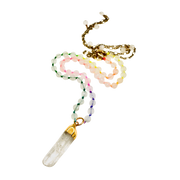 Beaded necklace with a clear crystal pendant on a white background