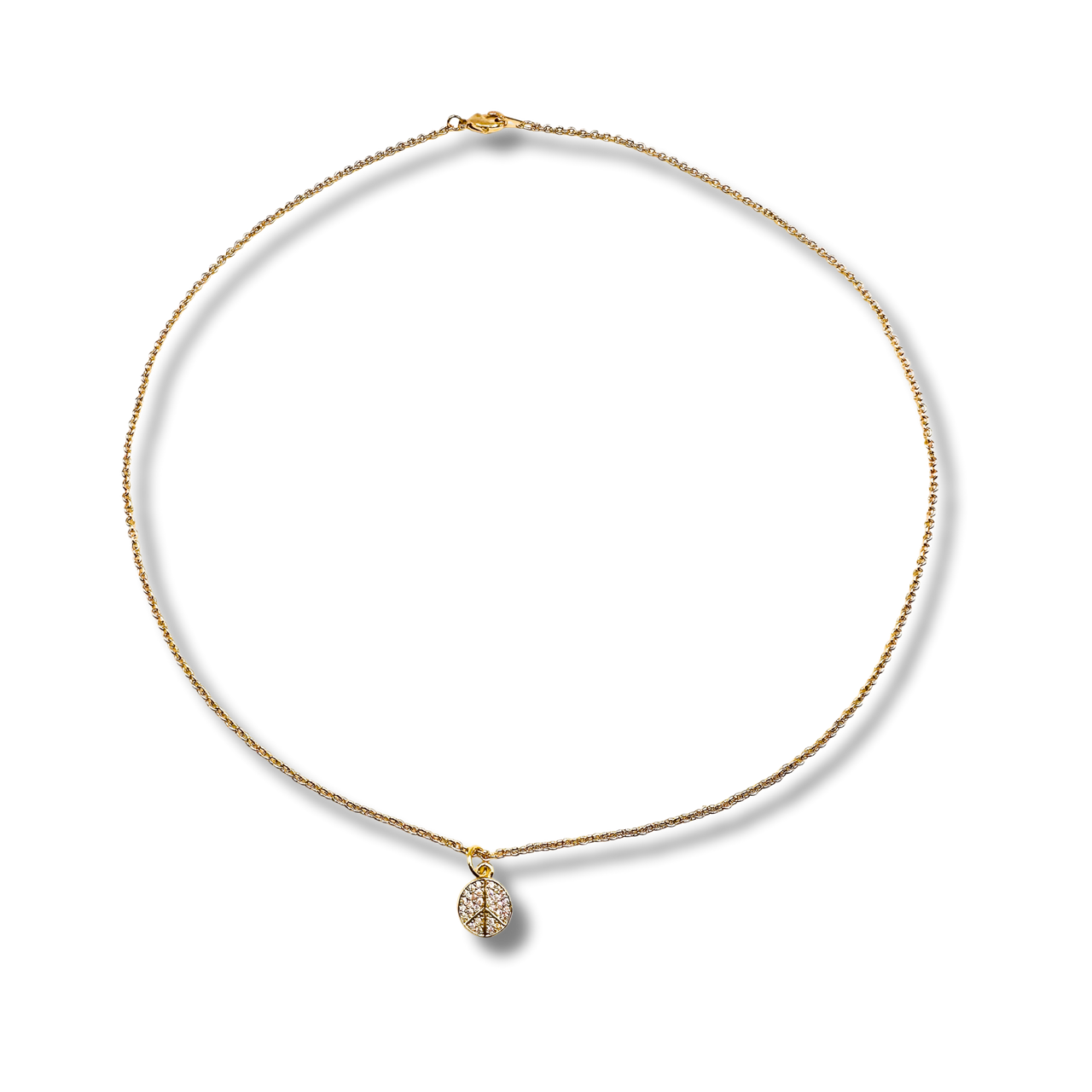Gold necklace with a teardrop-shaped pendant on a white background