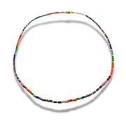 Multicolored beaded necklace on a white background
