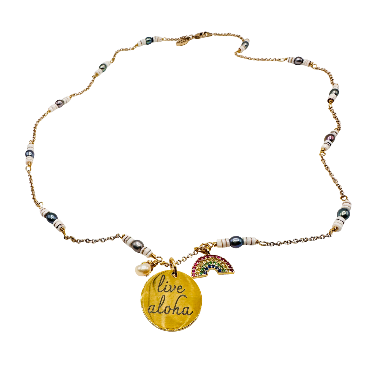 Necklace with 'live aloha' pendant and rainbow charm on a white background