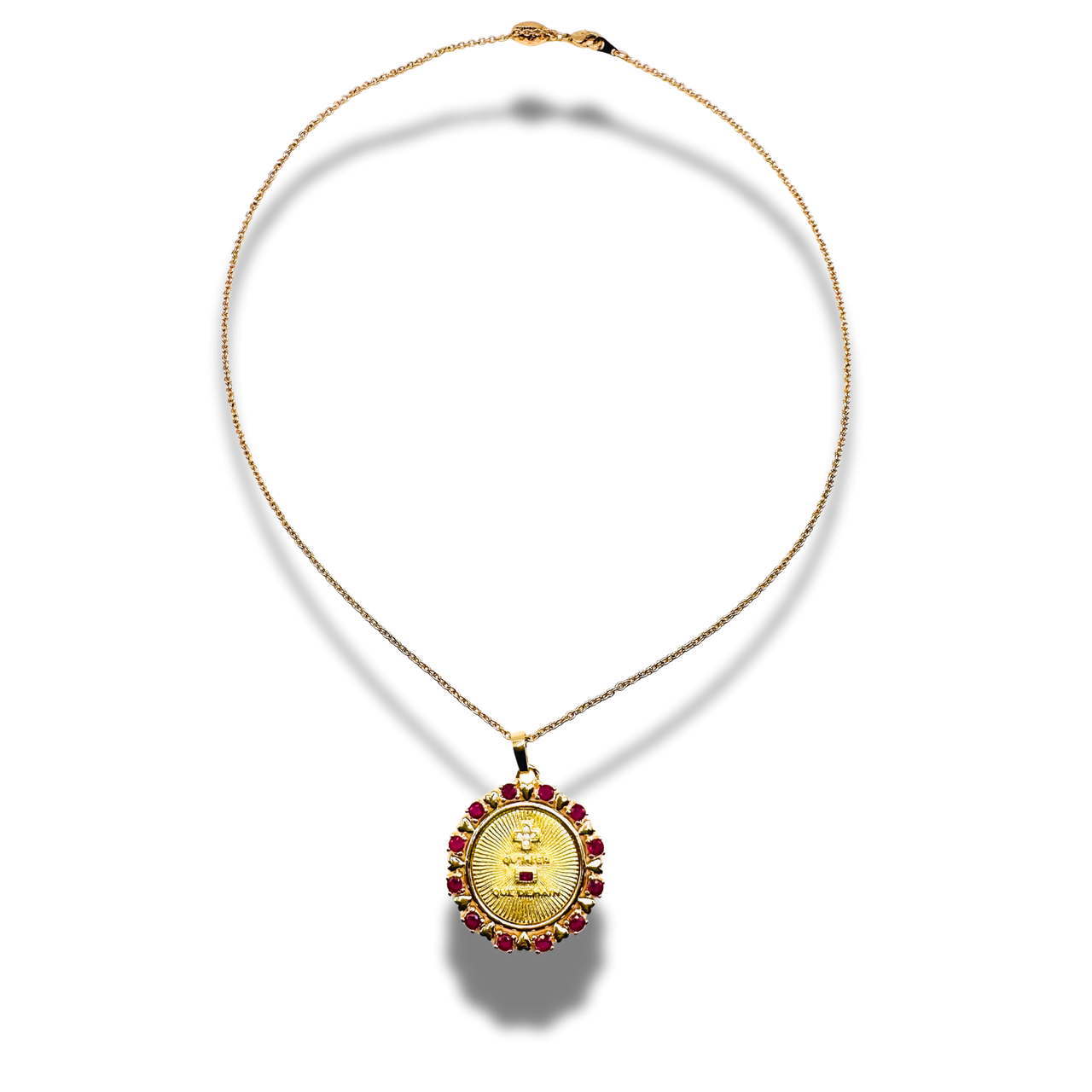 Gold necklace with a pendant on a white background