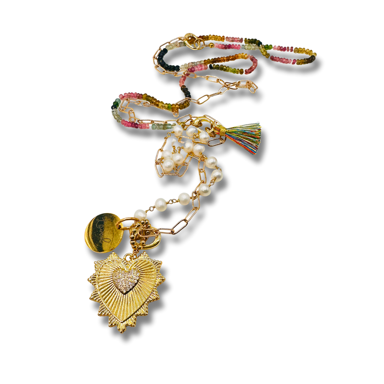 Colorful beaded necklace with heart pendant on a white background