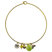 Playful 16" gold-tone collar necklace featuring a smiley face, rainbow, jade donut stone, lucky charms, and enamel details. Lightweight statement jewelry.