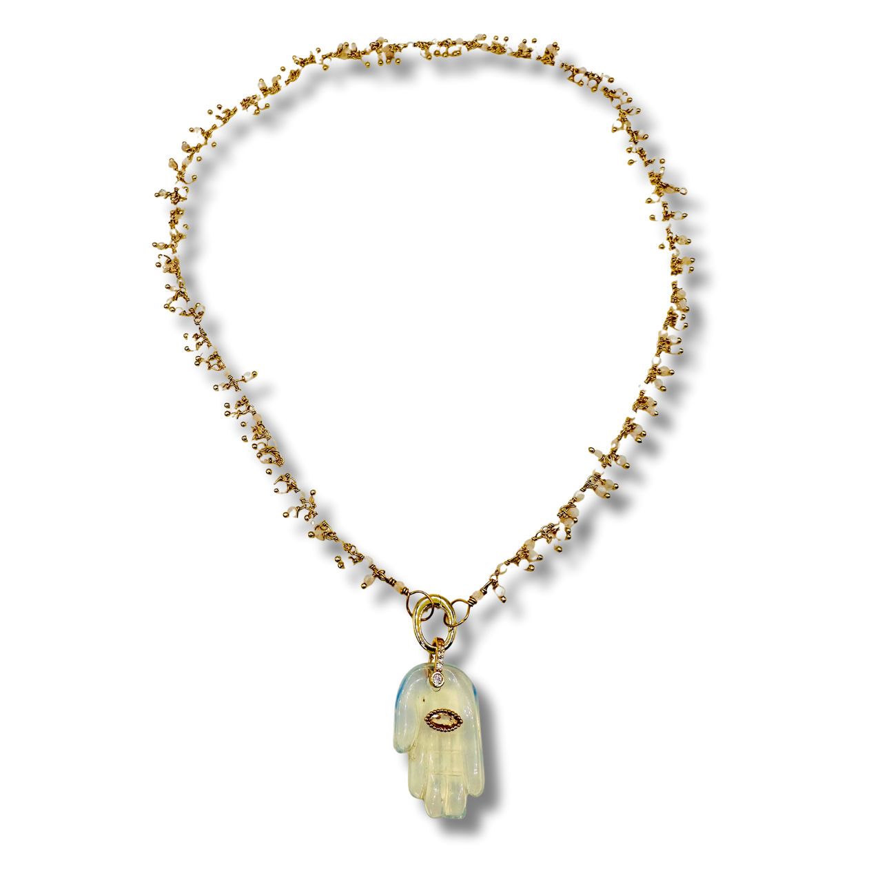 Necklace with a hand-shaped pendant on a white background