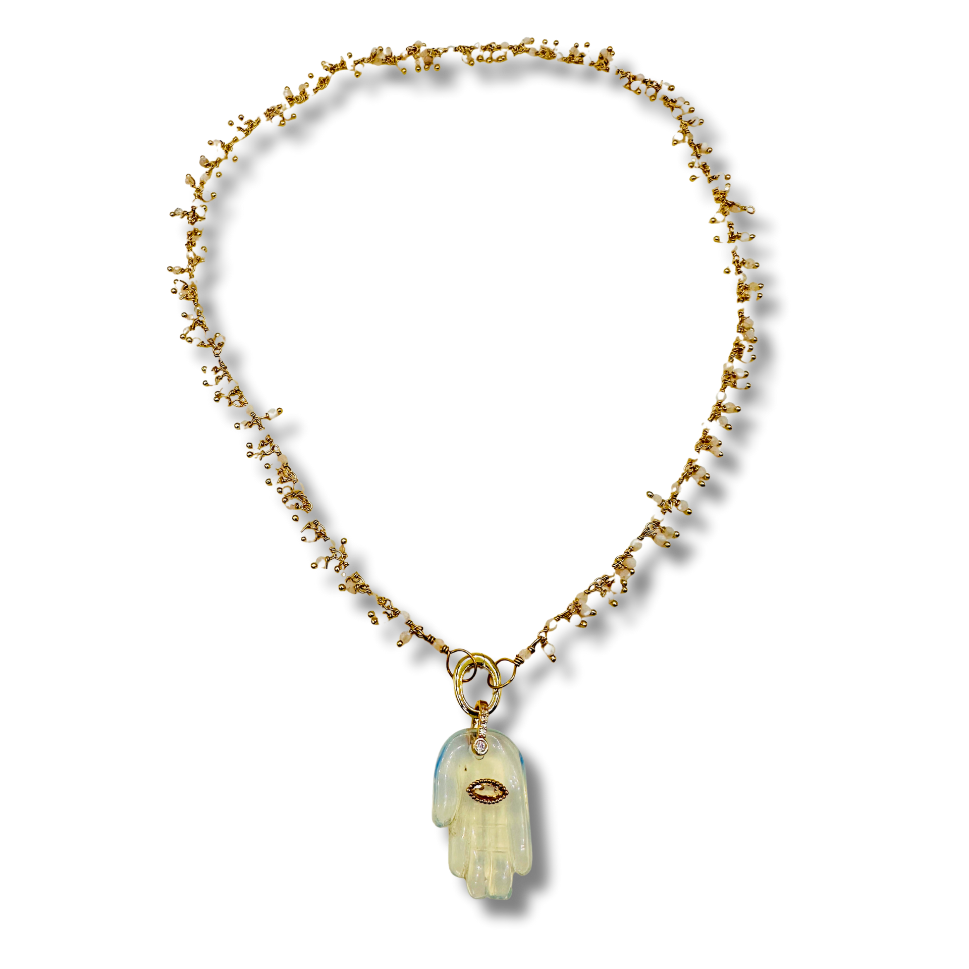Necklace with a hand-shaped pendant on a white background