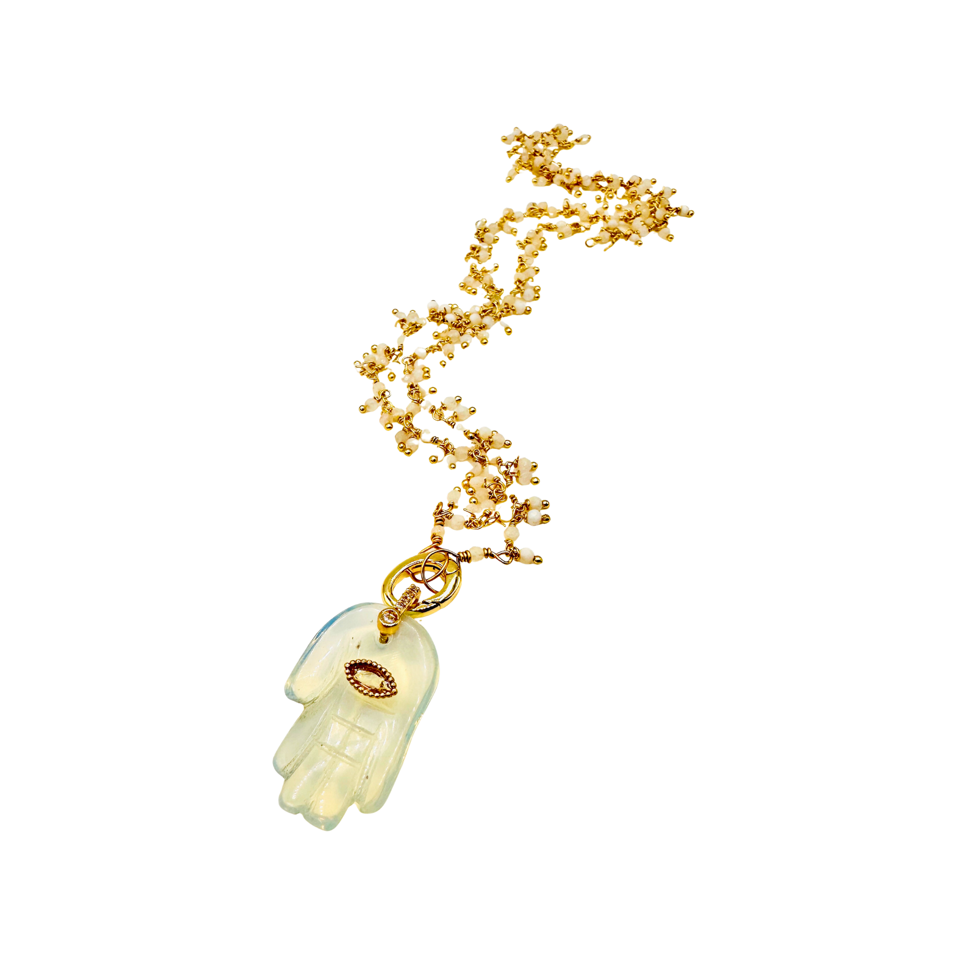 Gold necklace with a Hamsa hand pendant on a white background