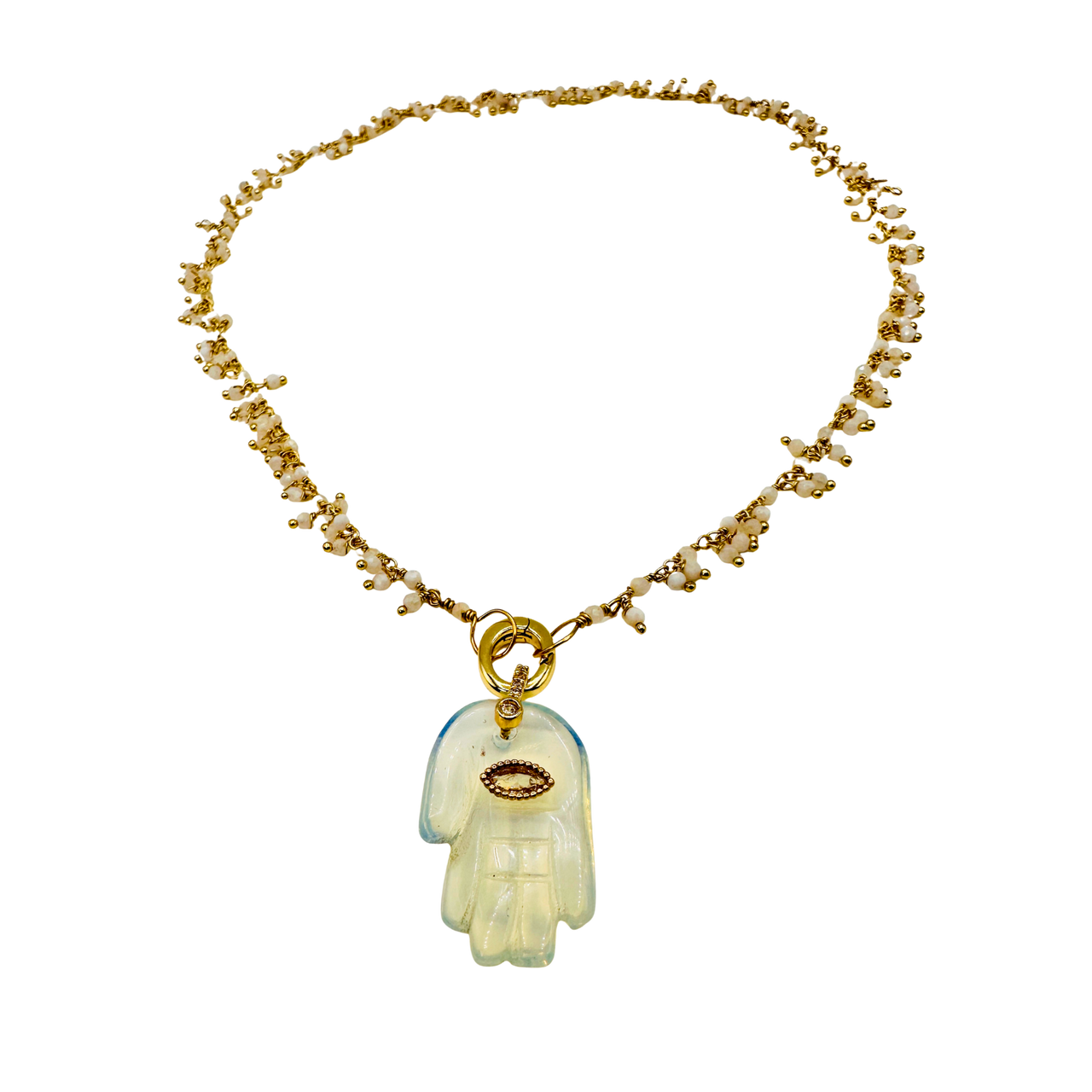 Necklace with a hamsa hand pendant on a white background