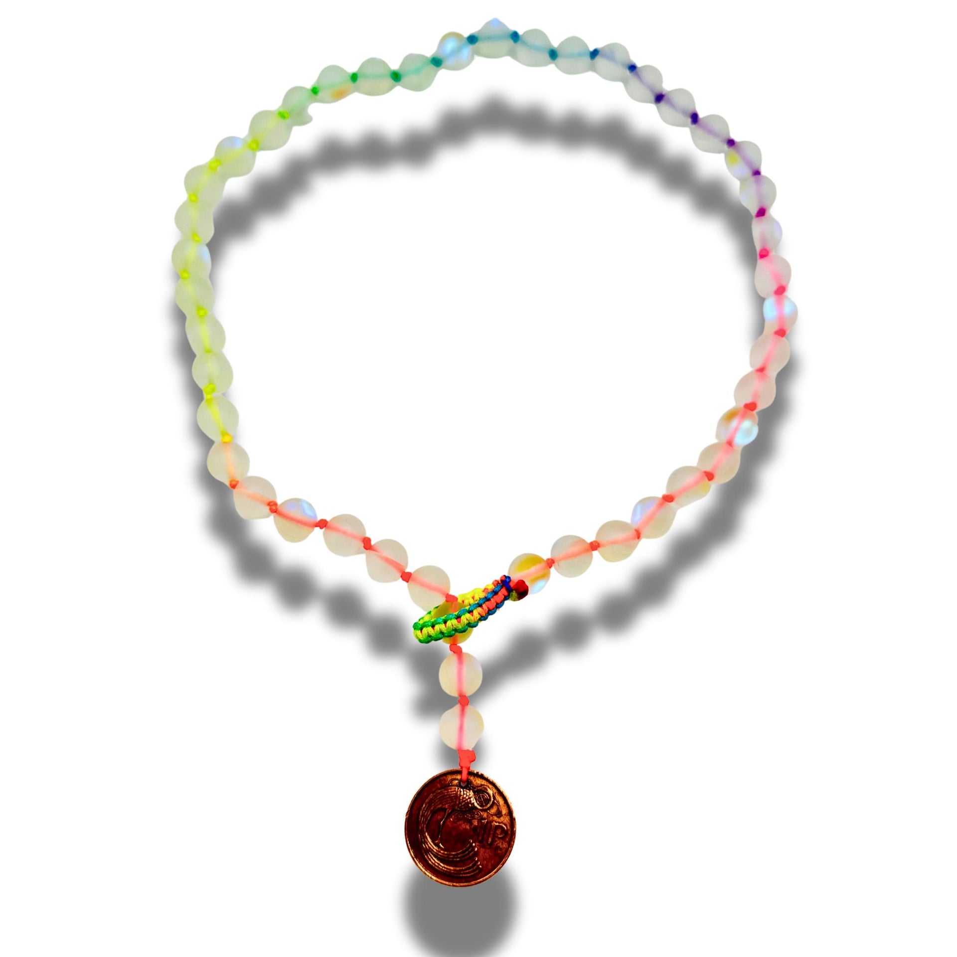 Colorful beaded bracelet with a brown pendant on a white background