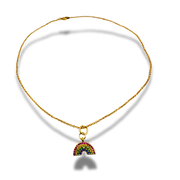 Gold necklace with a rainbow charm on a white background
