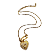 Gold heart-shaped pendant necklace on a white background