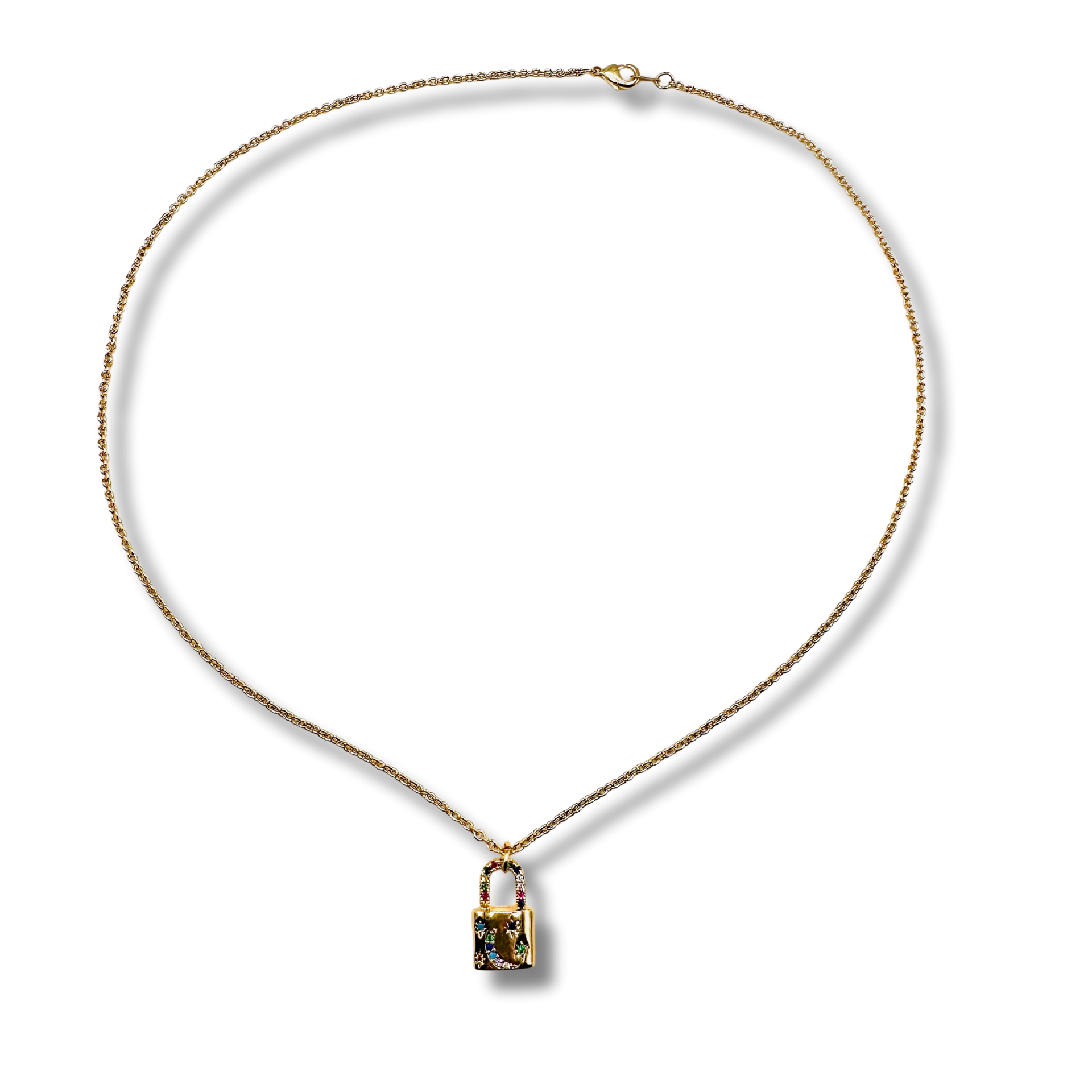 Gold necklace with a pendant on a white background