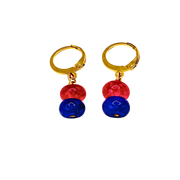 Pair of gold hoop earrings with red and blue beads on a white background