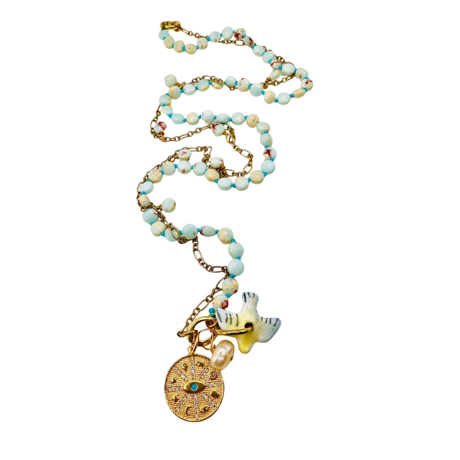 Necklace with beaded chain and decorative pendants on a white background