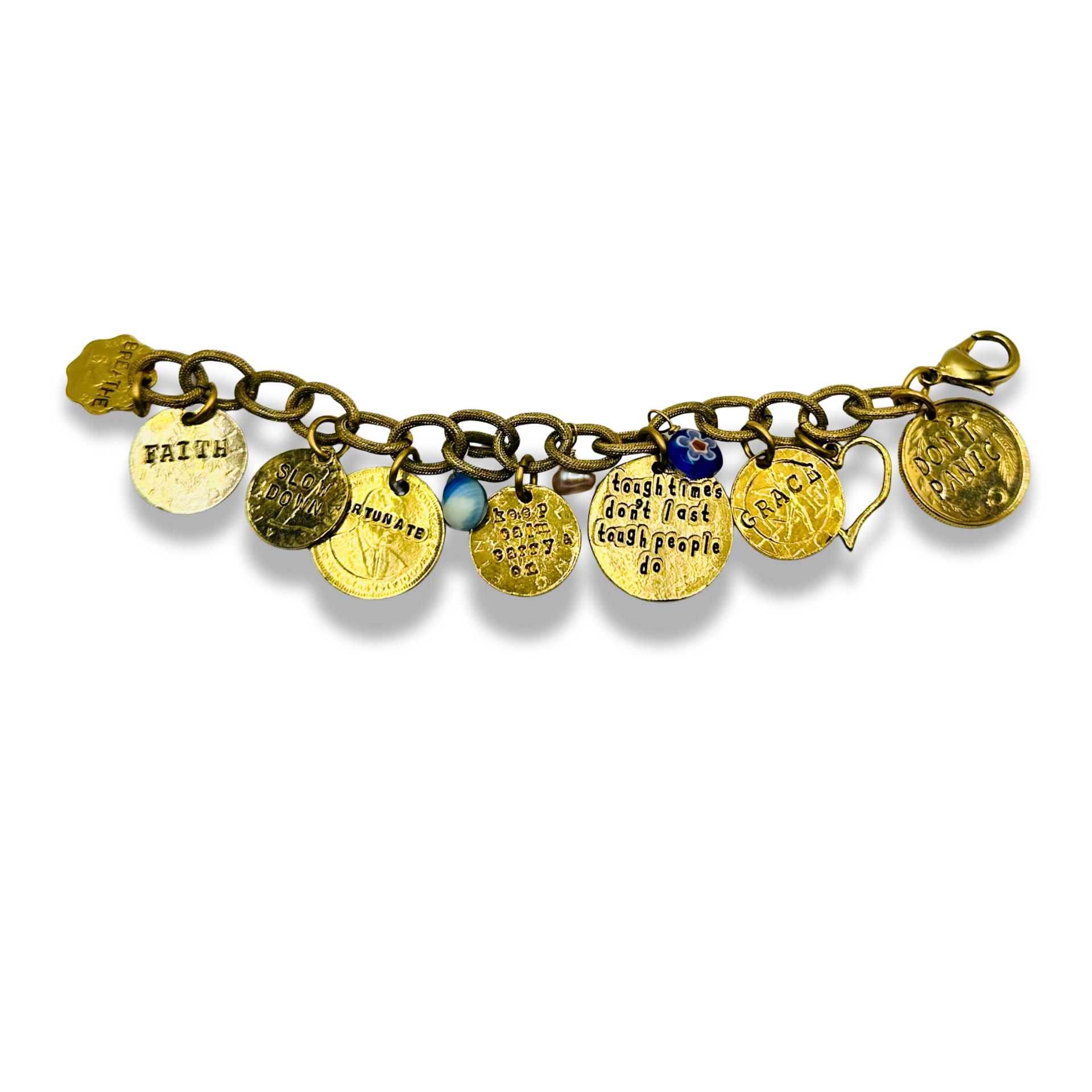 A gold-toned charm bracelet featuring multiple engraved and painted metal charms, including a small blue bead, displayed on a clean white background.