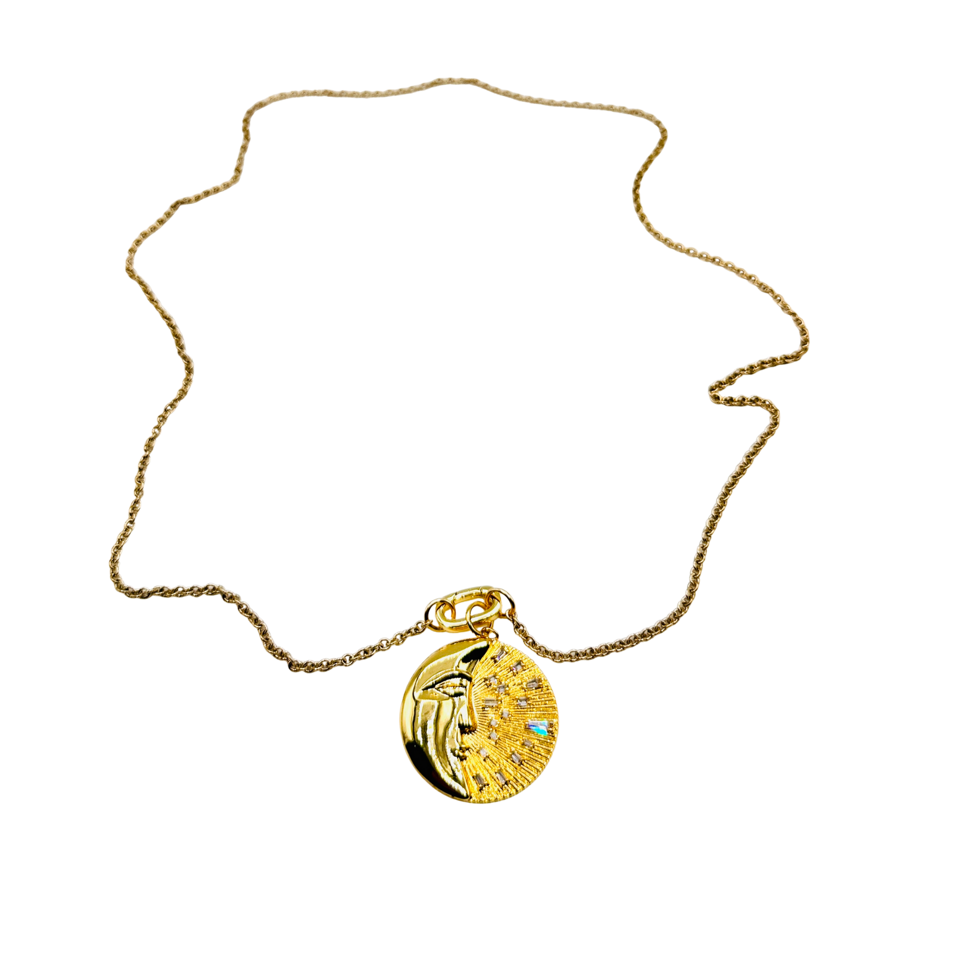 Gold necklace with a round pendant on a white background