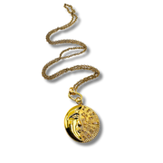 Gold necklace with a round pendant on a white background