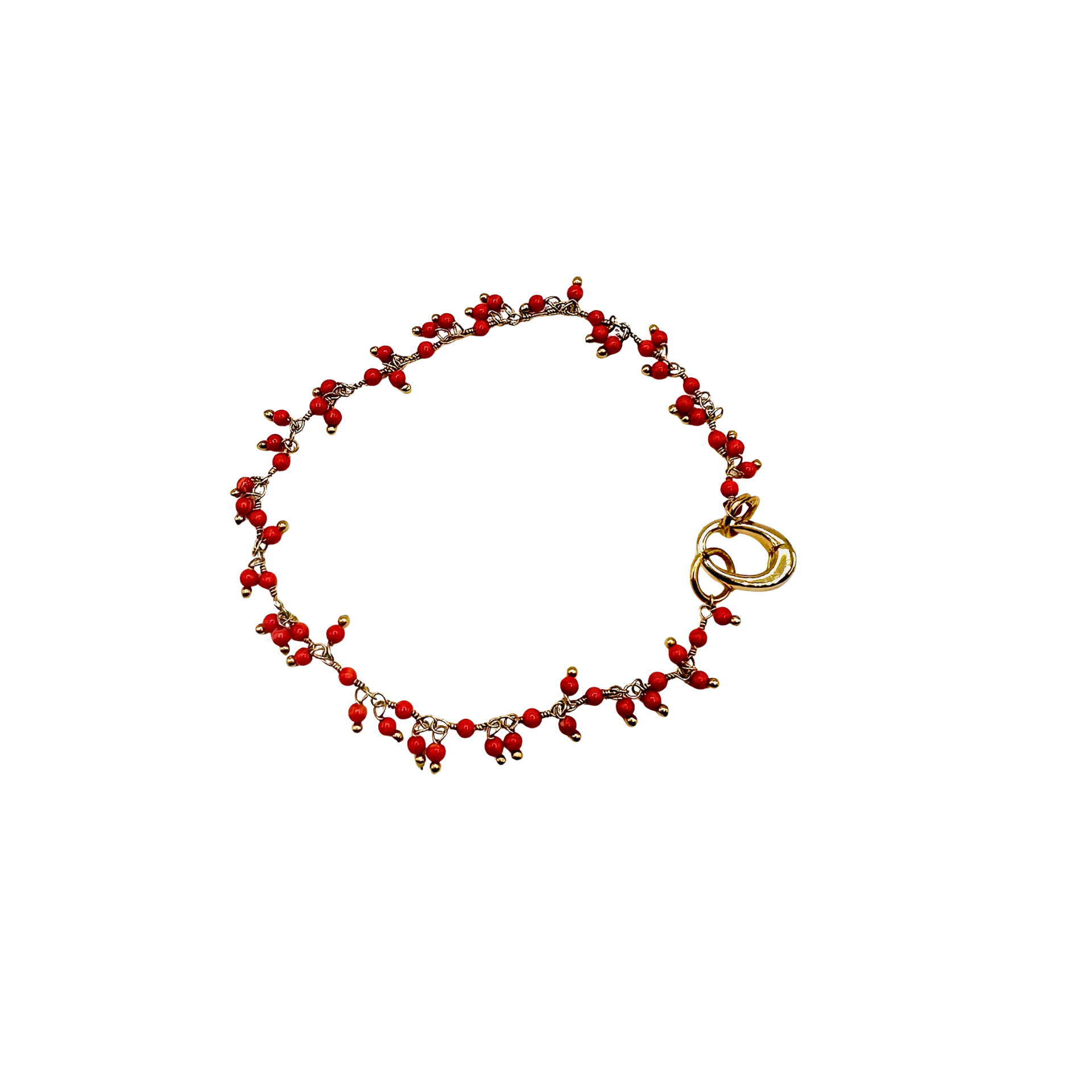 Red beaded bracelet with gold clasp on a white background