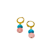 Pair of gold hoop earrings with pink and blue beads on a white background
