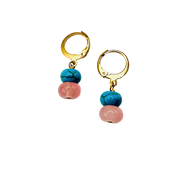 Pair of gold hoop earrings with turquoise and pink beads on a white background