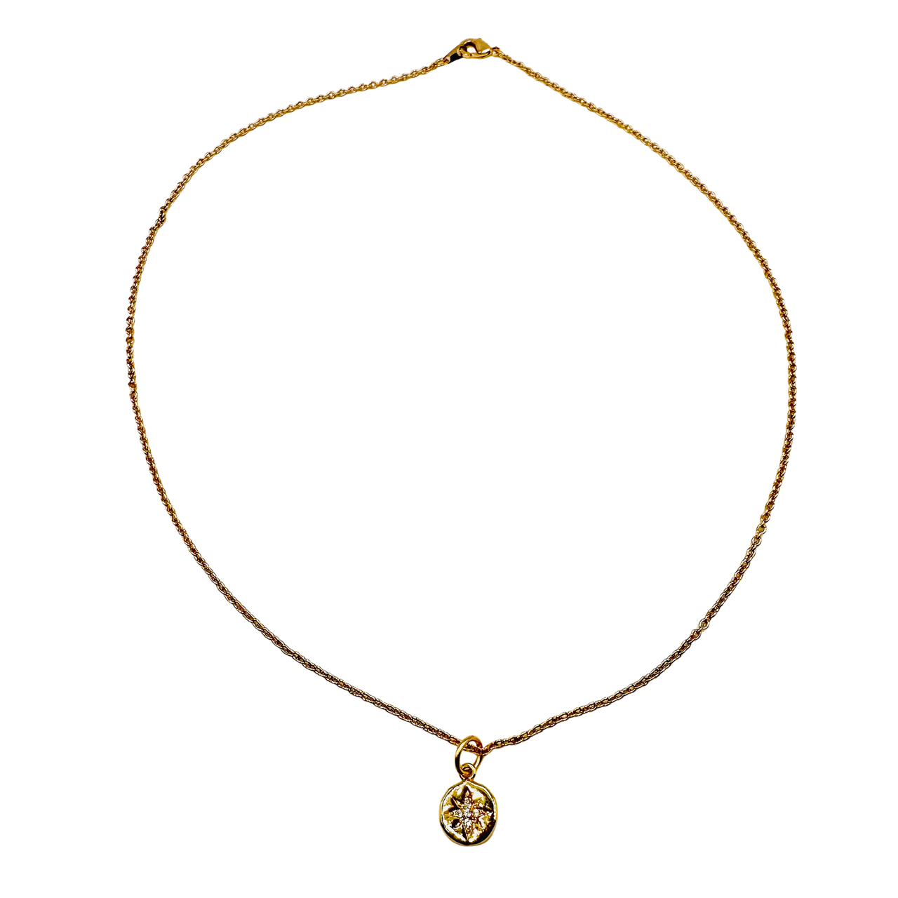 Gold necklace with a pendant on a white background