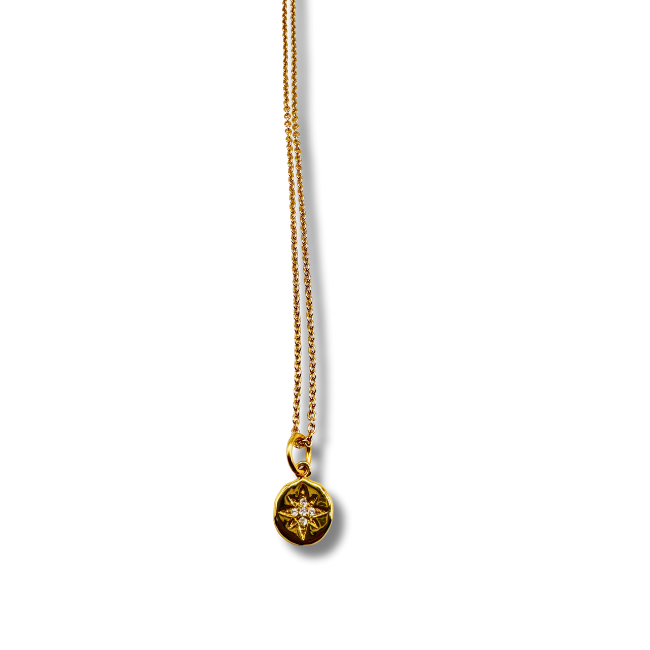 Gold necklace with a star-shaped pendant on a white background